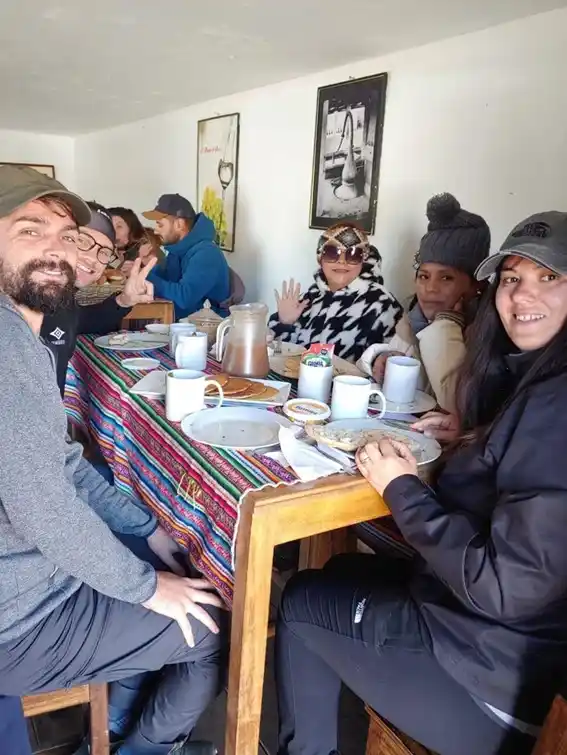 Tourists sharing lunch at a local restaurant after the hike to Humantay | Inca Culture Travel