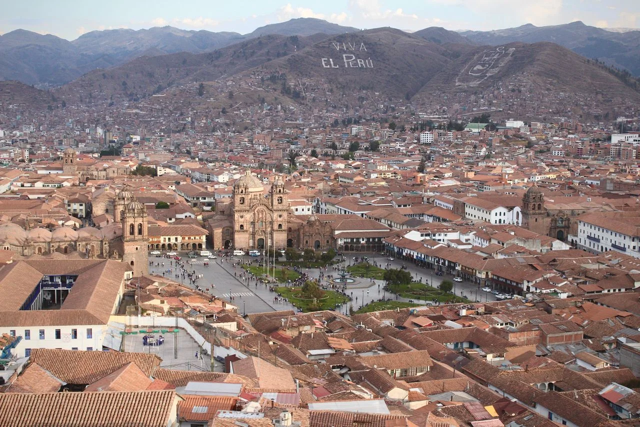 Panoramic view of Cusco historic center surrounded by the Peruvian Andes