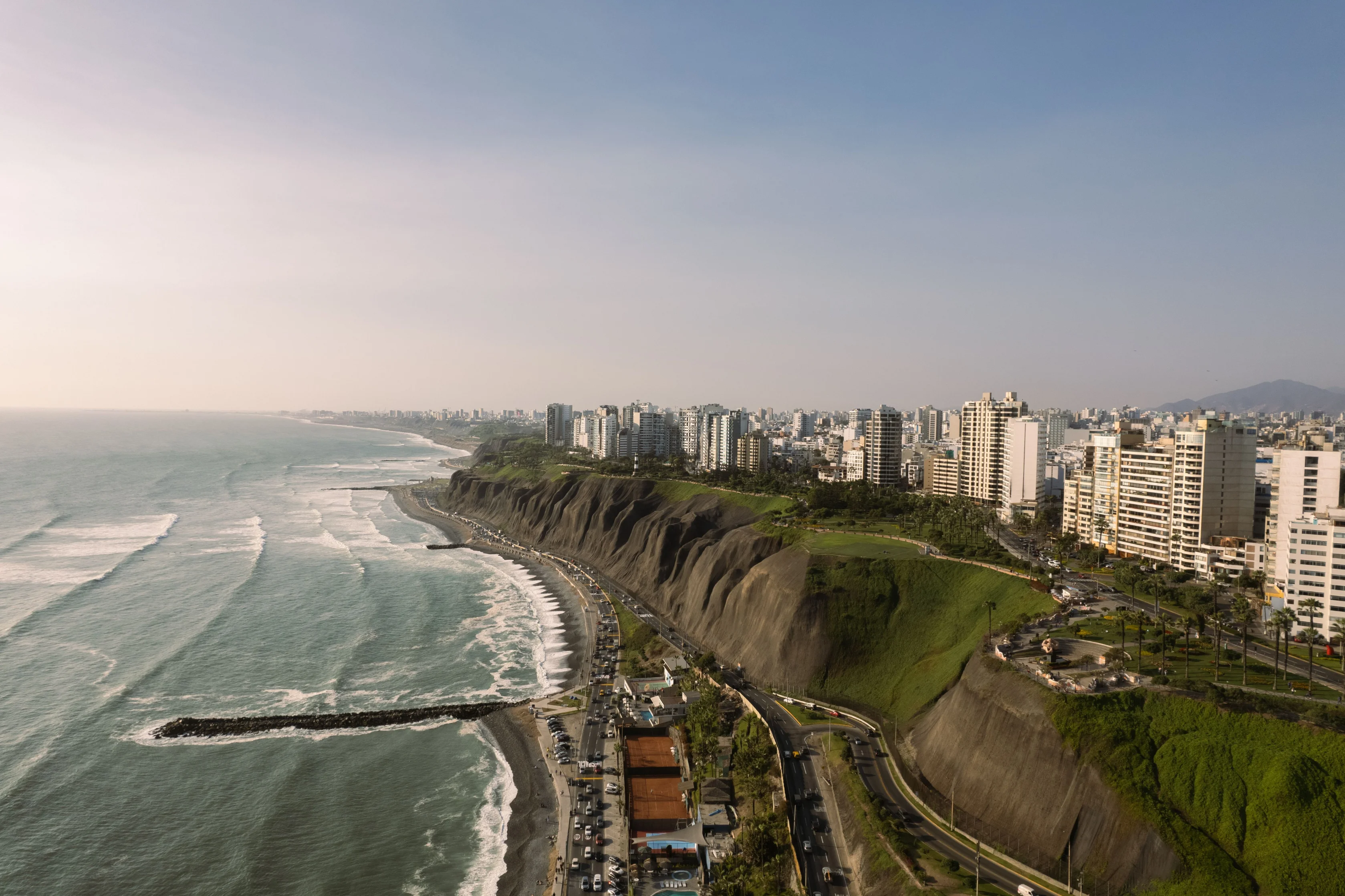 Pacific coast and green cliffs of Miraflores in Lima, Peru