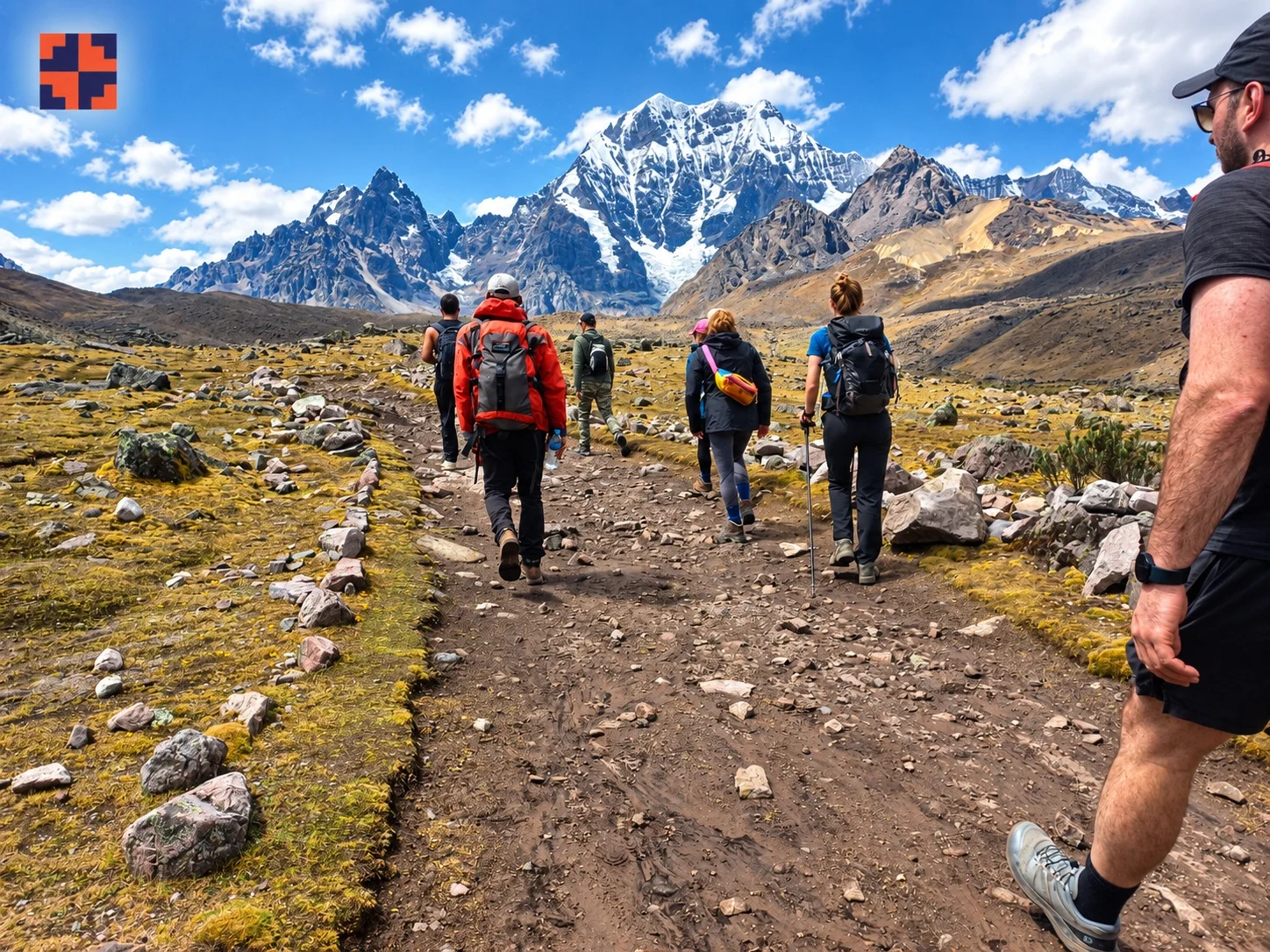 Hikers walking through a high-Andean landscape on the Salkantay Trek 4 Days to Machu Picchu.