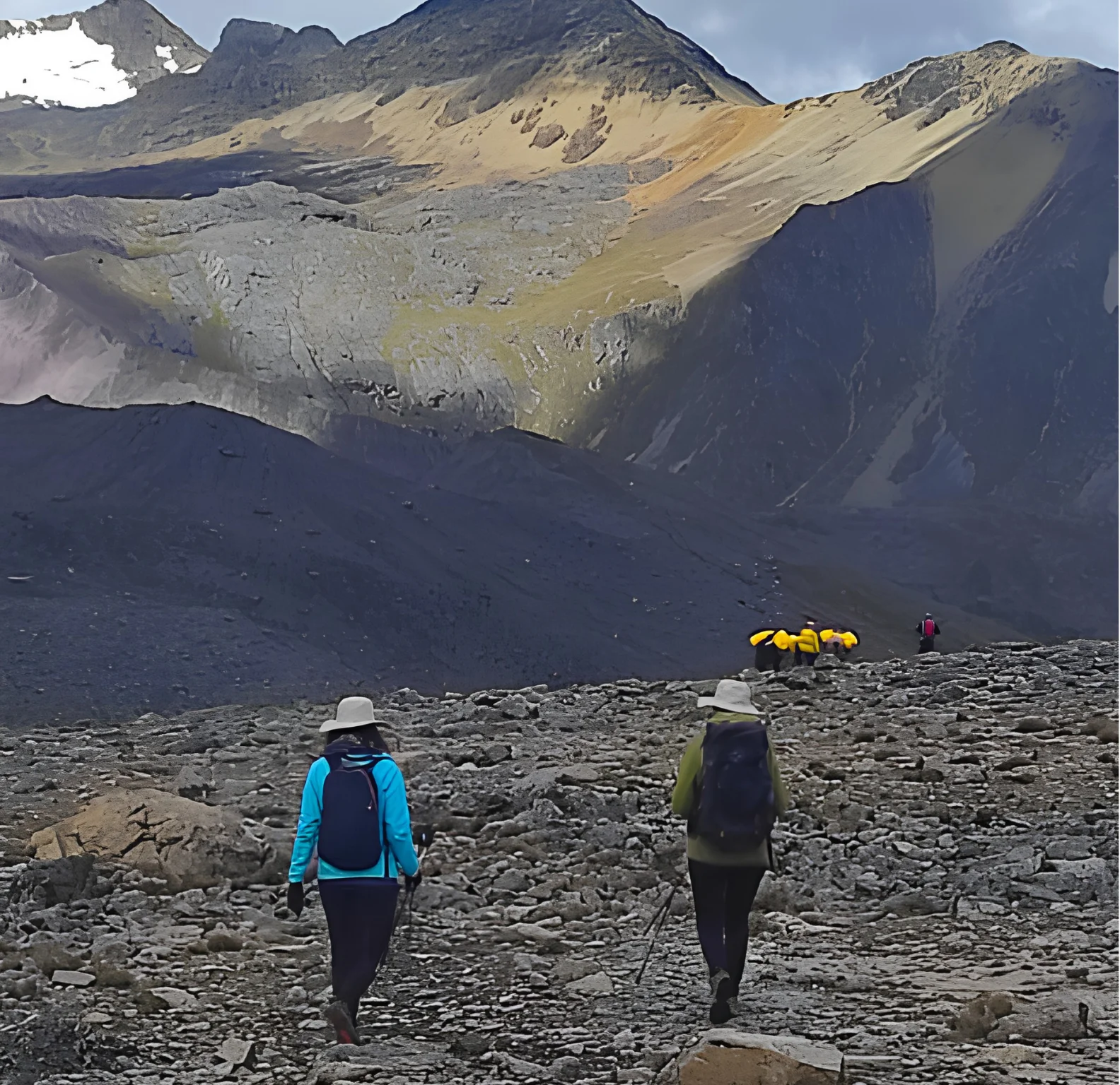 Hikers crossing a rocky high-altitude section of the Salkantay Trek 4 Days