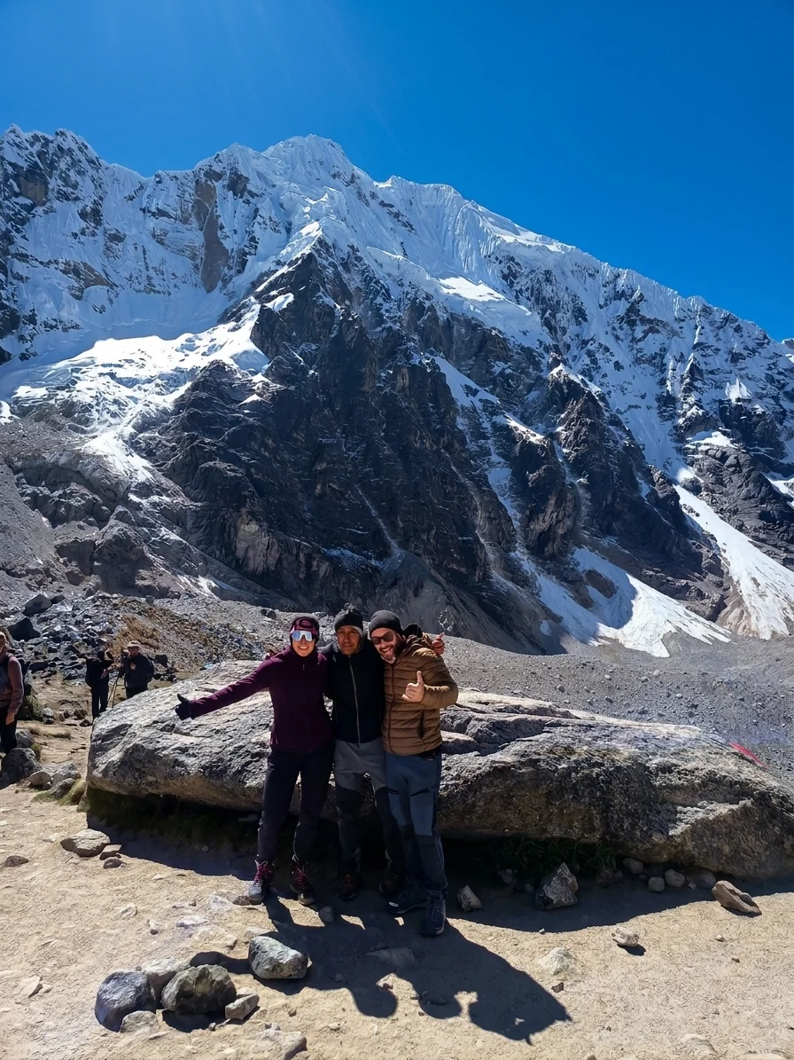 Travelers surrounded by snow-covered mountains during the Salkantay Trek 4 Days to Machu Picchu.