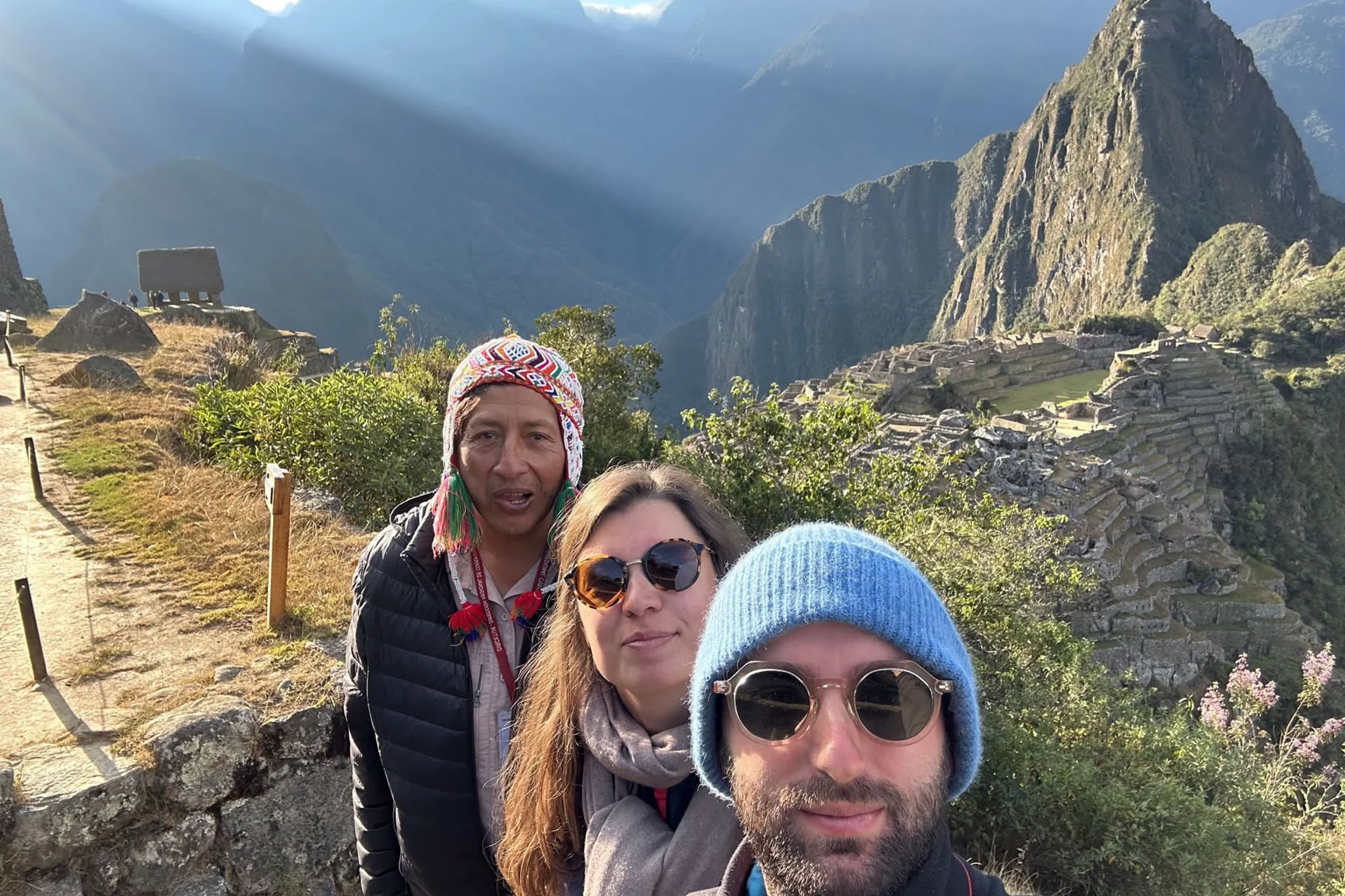 Travelers enjoying Machu Picchu on the final stage of the Salkantay Trek 5 Days.