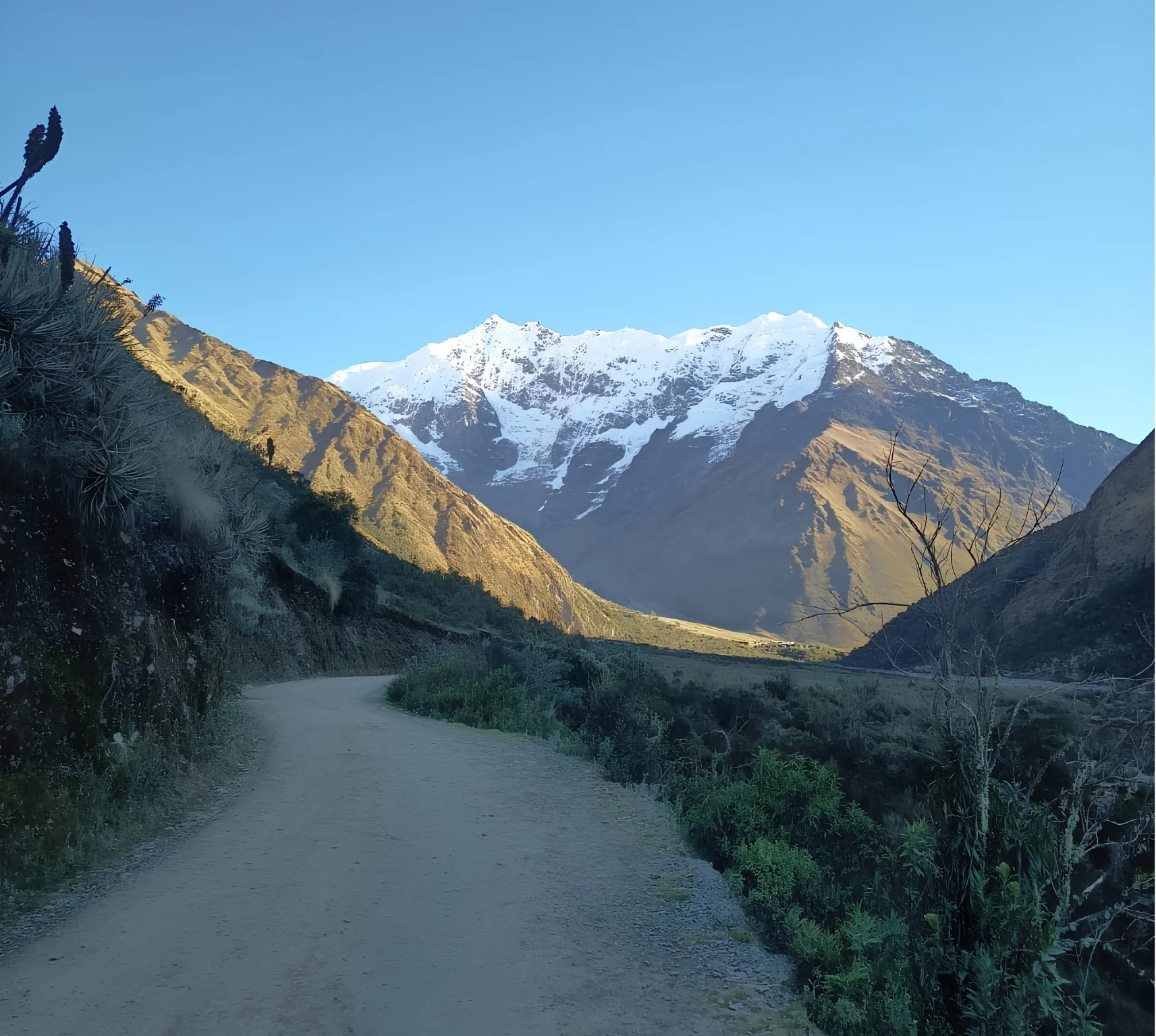 Mountain valley and snow-covered peaks along the Salkantay Trek 5 Days route.