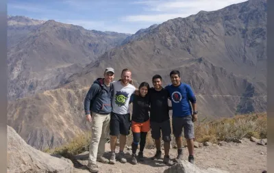 Group of hikers posing during a trekking tour in the scenic Colca Canyon