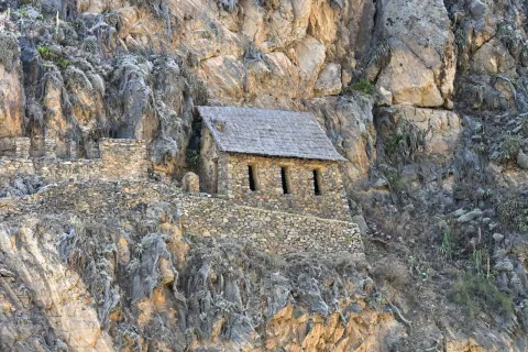Inca storehouses of Pinkuylluna built on the rocky hillside above Ollantaytambo, Cusco, Peru